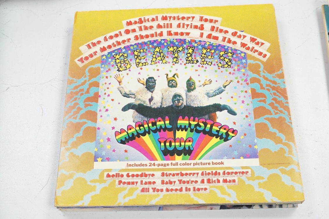 Fourteen LP record albums including eleven The Beatles and related; Sgt. Pepper’s Lonely Hearts Club Band (plus an additional three others), The Beatles at the Hollywood Bowl, Magical Mystery Tour, Revolver, etc., plus t